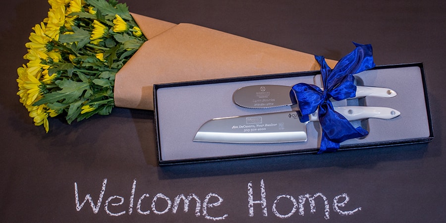 Welcome home cutco gift set and yellow flowers